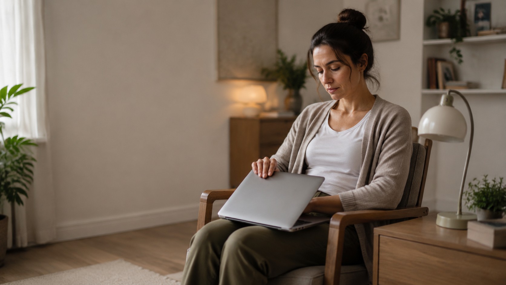 Woman reducing stimulation while feeling overwhelmed and trying to settle her nervous system.